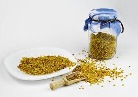 Pollen on plate and jar photo