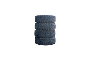 Four car tires stacked horizontally isolated on a white background photo