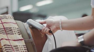 Physicaltherapist Doing Ultrasound Therapy on A Patient video