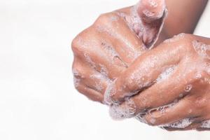 Close up of man washing hands photo