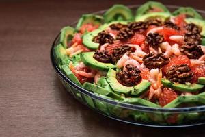 Avocado salad on the plate photo