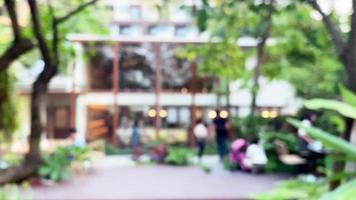 Blurred People Hanging out In Green Tropical Garden video