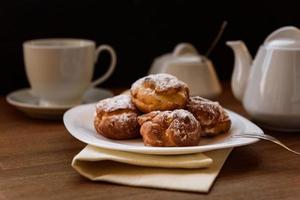 Eclairs with custard cream photo