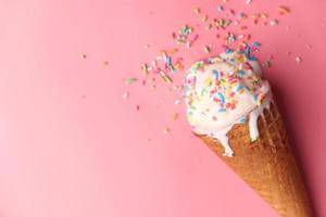 Top view of ice cream on pink background