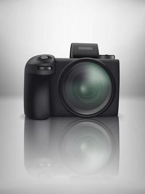 Black modern mirrorless digital camera on glass table