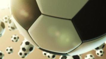 fallande fotbollar stockvideobakgrund med skärpedjup video