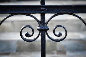 Detail of a forged black gate photo