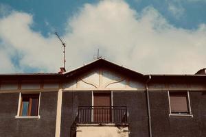 antenna tv on the rooftop of the house photo