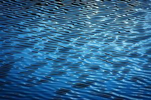 superficie de ondulación de agua azul foto