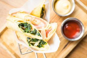 Fried spring roll with ham cheese and spinach vegetable photo