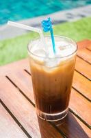 Iced coffee on table photo