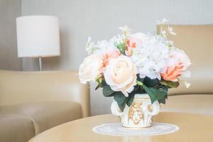 Flower vase on table photo