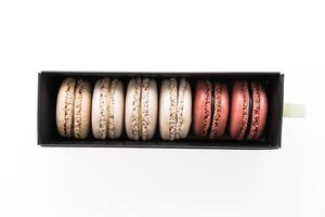 Macaroons box isolated on white background photo