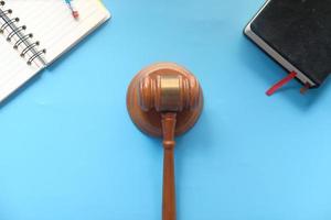 Gavel on blue background photo