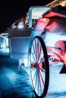 Krakow, Poland 2017- The old square of the night in Krakow with horse-drawn carriages photo