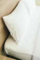 White pillow on bed photo