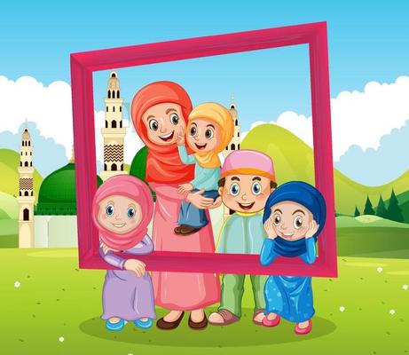 Happy family holding photo frame with mosque on the background