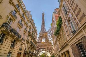 The Eiffel Tower and vintage buildings in Paris photo