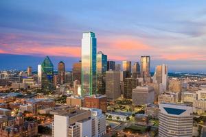 Dallas, Texas cityscape with blue sky at sunset photo