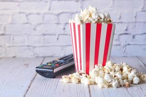 Popcorn and TV remote photo