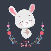 Easter bunny relaxing with festive egg in their hands vector