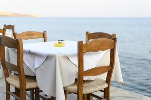 Cafe tables on the sea, selective focus photo