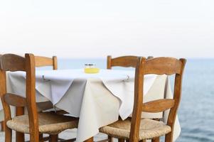 Cafe tables on the sea, selective focus photo