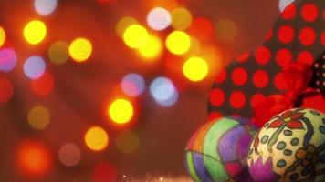 Paschal Easter Eggs With a Gift Box and Colorful Bokeh Flashing Lights video