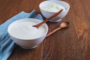 Two bowls of yogurt photo