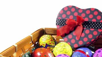 Paschal Easter Eggs and a Heart Shape Gift Box in a Wooden Basket video