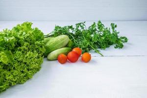 Vegetables on a white table photo