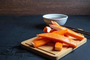 Crab sticks and sauce photo