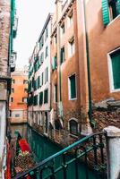 Narrow canals of Venice Italy photo