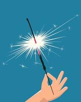Close-up of a sparkler in hand vector