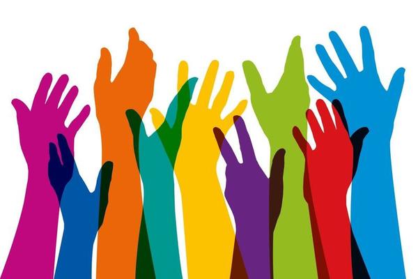 Raised Hands of Different Colors Symbol of Unity