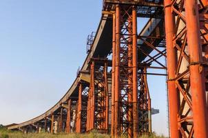 Bridge under construction with road photo