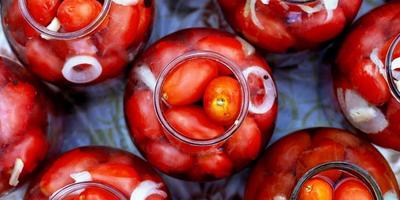 Jars of tomatoes photo