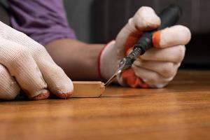 Fixing a wood laminate surface photo