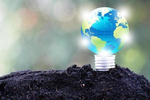 bombilla de luz, salvar el mundo y el concepto de eco empresarial