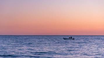 Sunset on the Bay of Angels in Nice, France photo