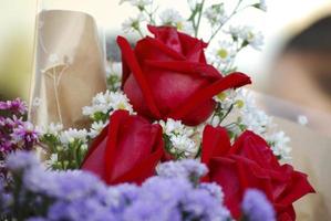 Red roses bouquet on graduation day photo