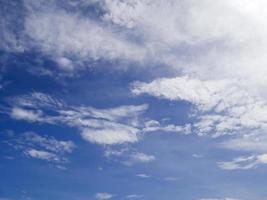 Blue sky background with white clouds photo