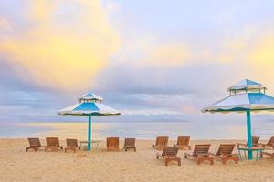 Sun beds on the beach photo