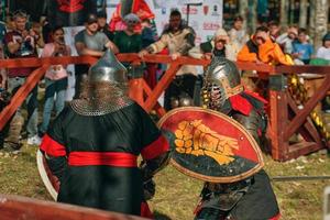 Battle of knights in armor with swords in Bishkek, Kyrgyzstan 2019