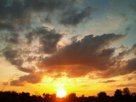 Orange sunrise with clouds photo