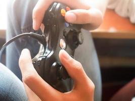 Man holding an console photo