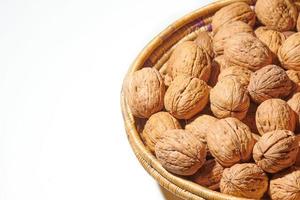 Basket of walnuts isolated photo