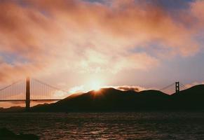 Golden Gate Bridge in San Francisco at sunset photo