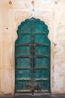 Antique rustic ancient wooden door photo