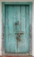 Antique rustic ancient wooden door photo